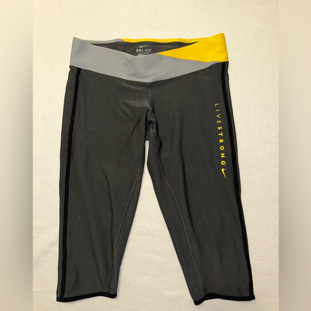 Nike dri fit Livestrong yellow women’s capri pants/shorts sz M cropped w/pocket